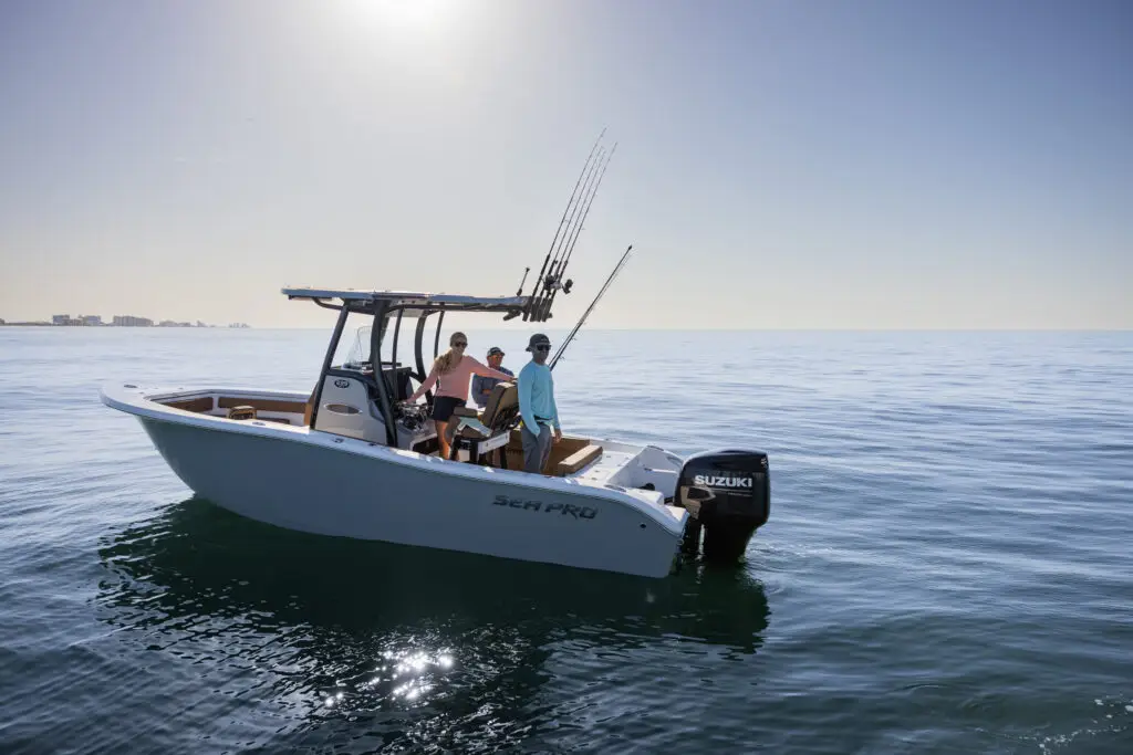 small recreational boat with people fishing